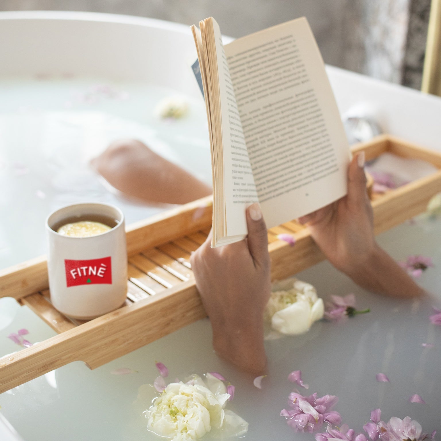 Wellness, Life Balance, Woman reading a book in bathtub
